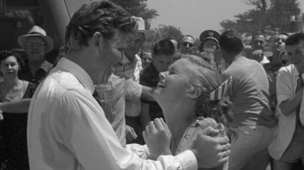 Rhodes eyes Remick's teen majorette.