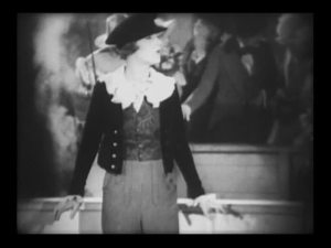 An unconvincing boy in the 1920s but a 1980s fashion queen!