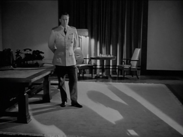 Lang was not allowed to go into details but I think he puts his point across rather well: Thorndyke is not having a very good time as a prisoner of the Nazis.