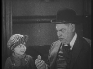 Here is money! Don't tell your mother I have a piece on the side. (Remember, this child is SIX)