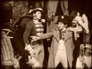 No sticking his hand into his lapel, no short jokes.