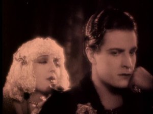 Terrific. I'm all ready to race and I'm stuck here with some cross between Jean Harlow and Raggedy Ann.