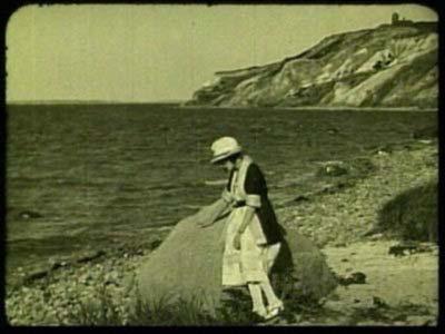 Annabell mopes on some admittedly beautiful rocks.