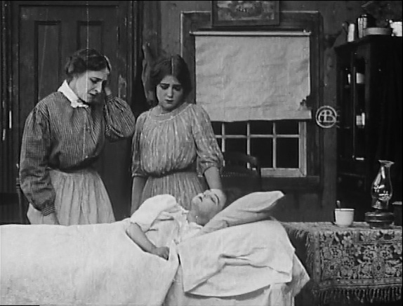 Kate Bruce and Mary Pickford as the poor neighbors.