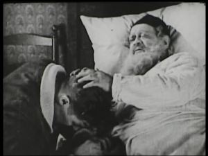 Sammy at his father’s bedside.