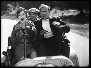 Bessie at the wheel.