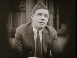 He is thinking about pie. I'm not being sarcastic. The movie says he is literally thinking about pie.