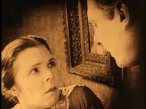 Dale Fuller in the clutches of Lew Cody.