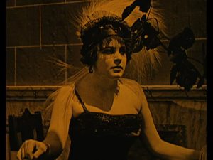 Our mysterious lady grifter.