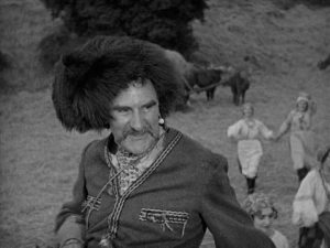 Ernest Torrence's hat grants him unquestionable power. This is due to is two main attributes: its bigness, and it's furriness.