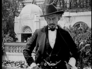 Please note the lovely construction behind Mr. Hersholt.