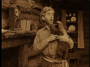 God’s country, where a man can get gnawed on by a bear cub if he darn well pleases!