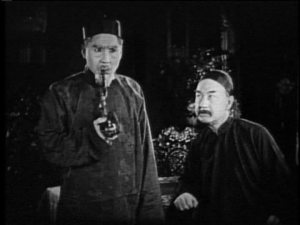 Poor Fujita is not impressed with his co-star’s phony Chinese-isms.