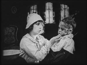 Good lord, Dorothy’s still at it! We get it. You look slightly like Lillian Gish. Now stop mouthing “oh oh”